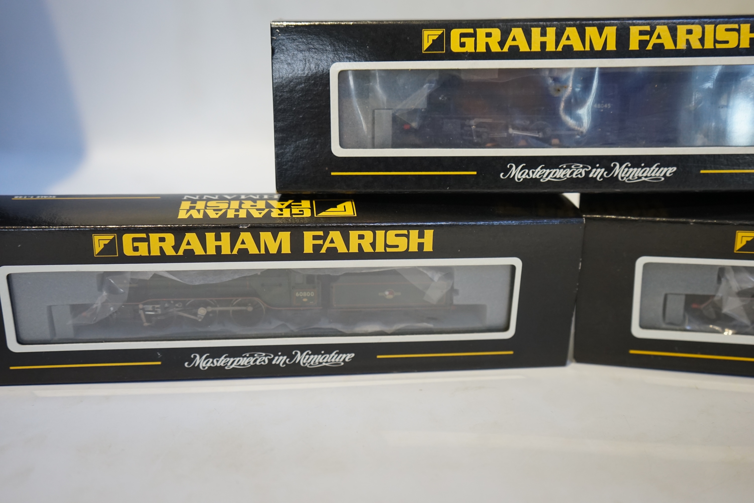 Three boxed Graham Farish N gauge railway BR tender locomotives; a Class 8F, 48045 (372-151), a Class V2, 60807 (372-601), and a Class V2, 60800 (372-600). Condition - good.